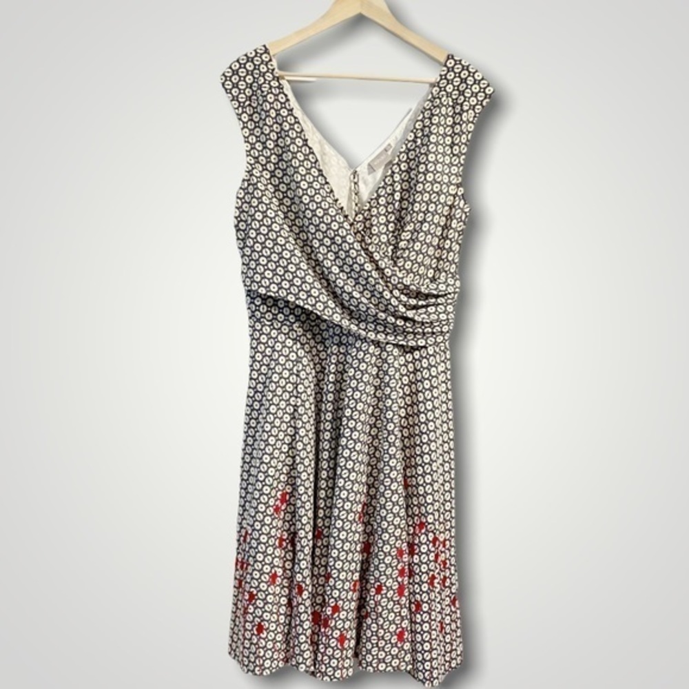 Elegant Black and White Patterned Dress with Red Accents